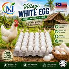 Village White Egg promotional graphic showing a large carton of white eggs in the center, a white chicken on the left, a basket of eggs on the right, and a rural house and trees in the background. Brand logo 'MJ' appears top left, with 'Product of Malaysia' and Malaysian flag at top right.
